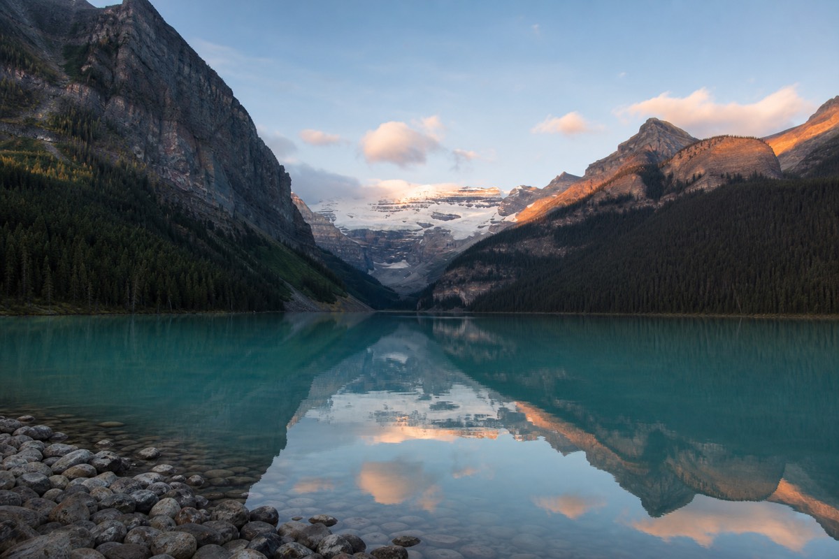 The Icefields Parkway winding north from Lake Louise toward Jasper past glaciers and turquoise lakes